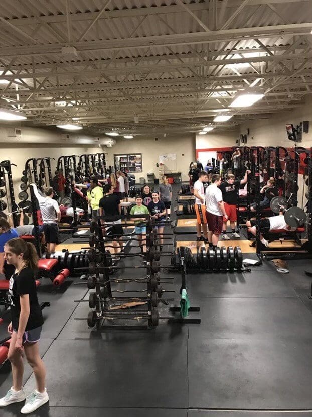 Students work out in the Estherville Lincoln weight room.
