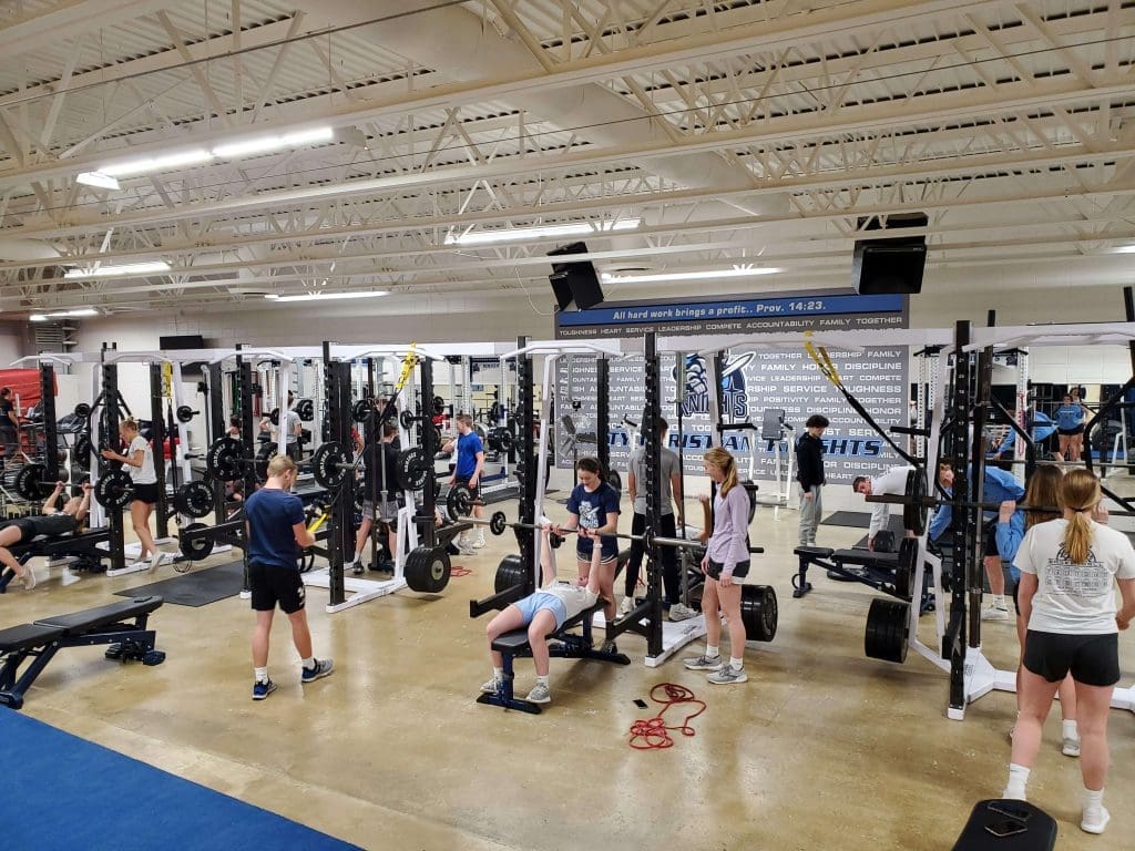 Students workout in the Unity Christian weight room.