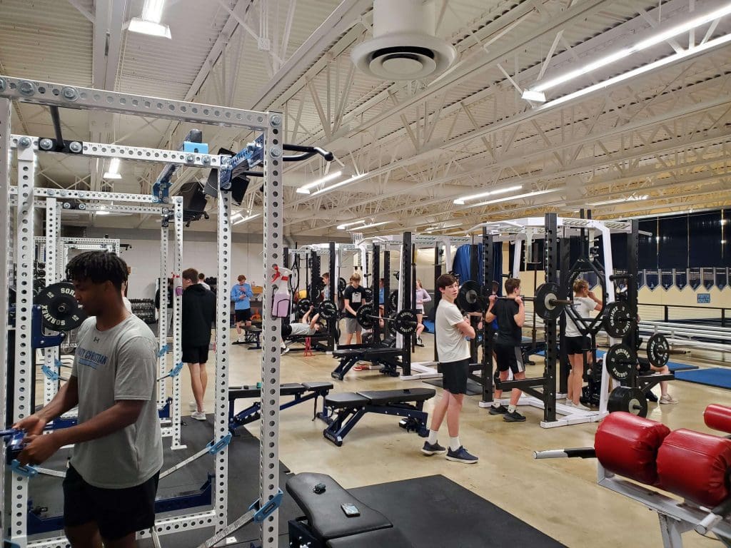 Students workout in the Unity Christian weight room.