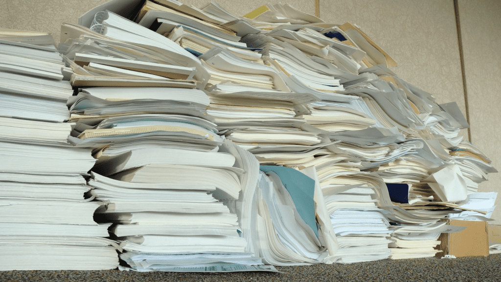 Stacks of paper and documents.