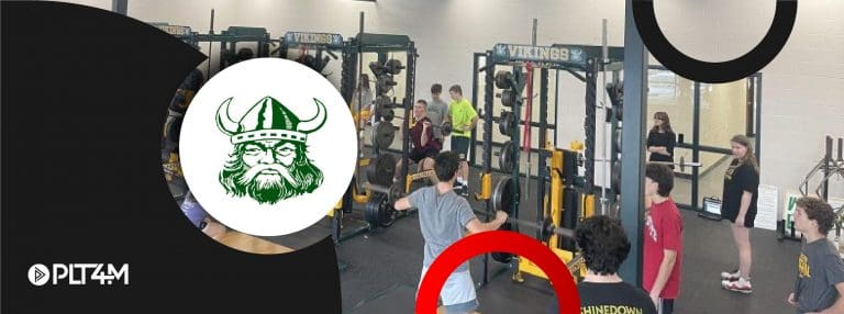 Evergreen's high school weight room with students working out