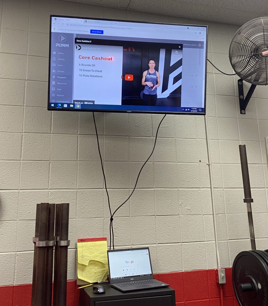 A PLT4M video displayed in the Jacksonville High School weight room.