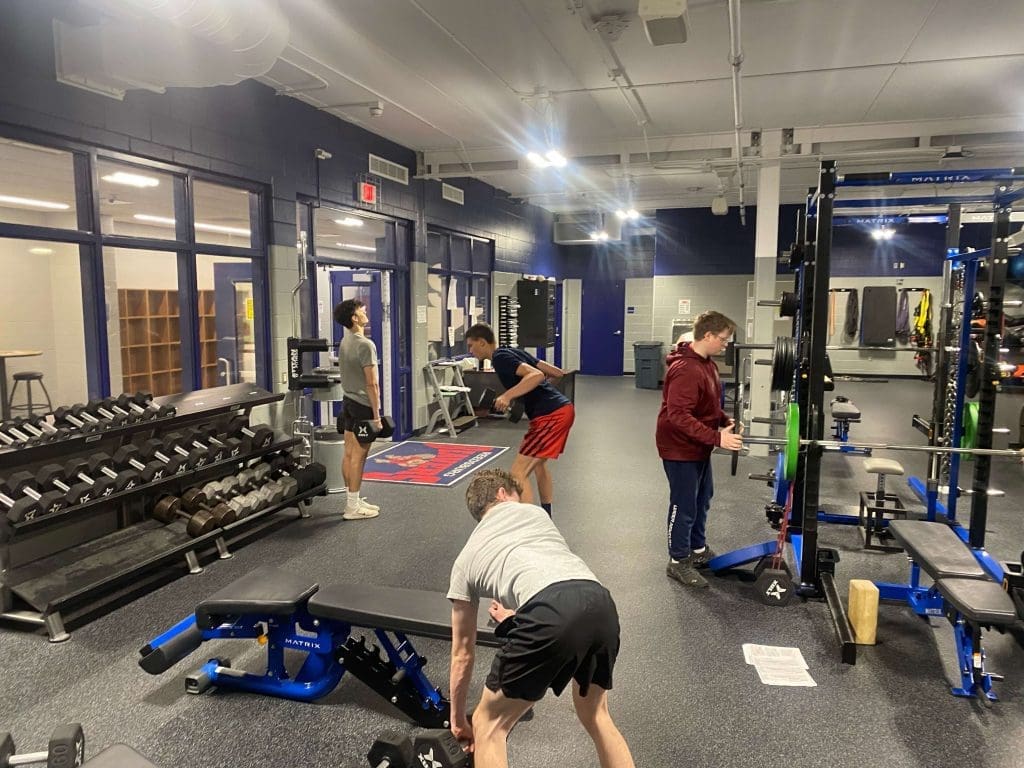 Students work out in the Reedsburg High School weight room.
