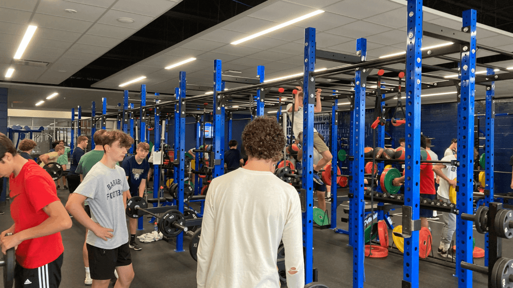Students work out in the Baraboo High School weight room.