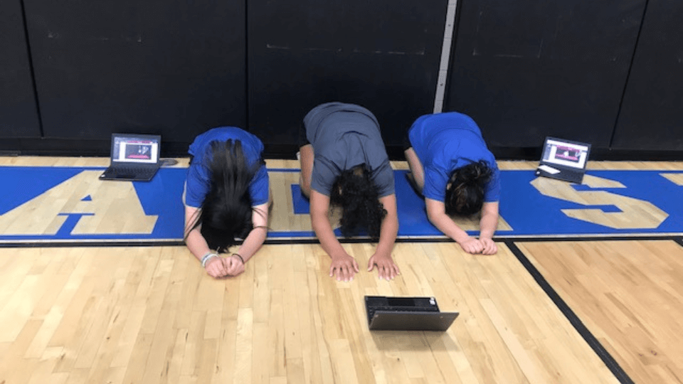 Paradise High School students working out.