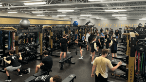 Andover High School student athletes work out in the weight room.