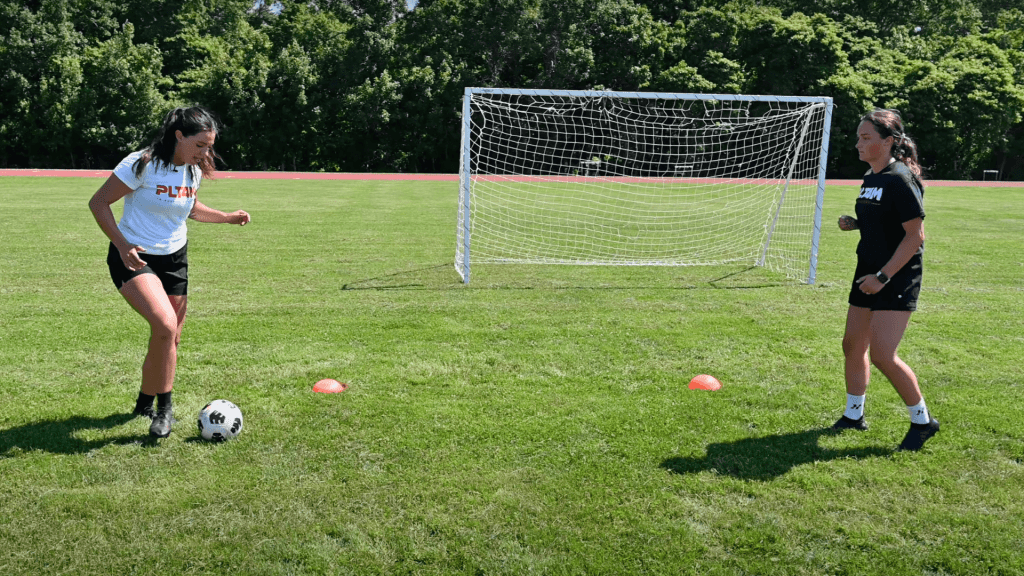 PLT4M instructors in a video from soccer lesson plans.