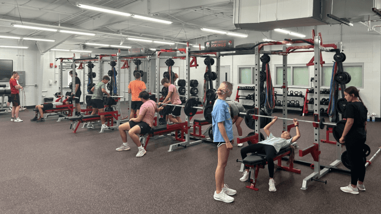 Students working out in Barr Reeve weight room.